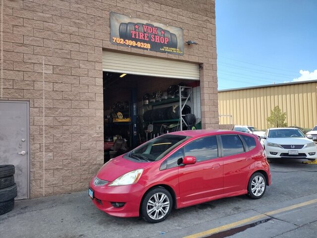 Red Honda Fit Tire Shop 024 — VDK Tire Shop