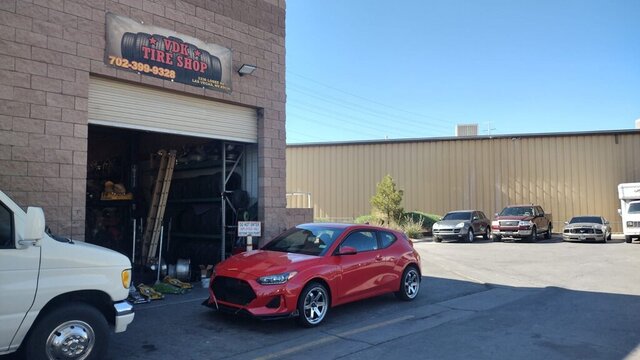 Red Hyundai Veloster Tire Shop 006 — VDK Tire Shop