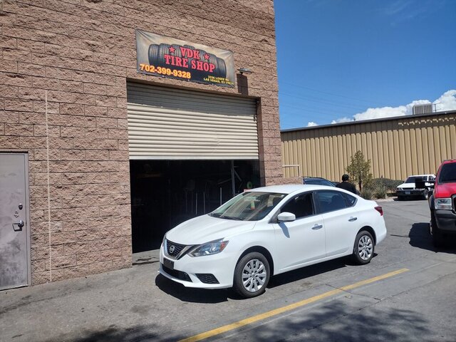 White Car Outside Vdk Tire Shop 025 — VDK Tire Shop