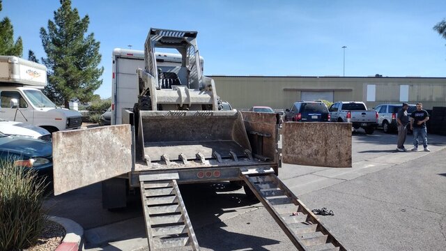 Skid Steer Loader On Trailer 002 — VDK Tire Shop