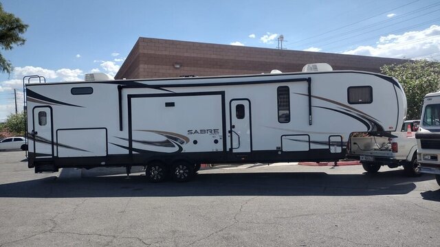 White Sabre Travel Trailer Exterior 010 — VDK Tire Shop