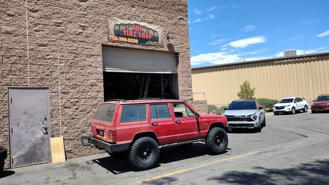 Red Jeep Cherokee Tire Shop 004 — VDK Tire Shop