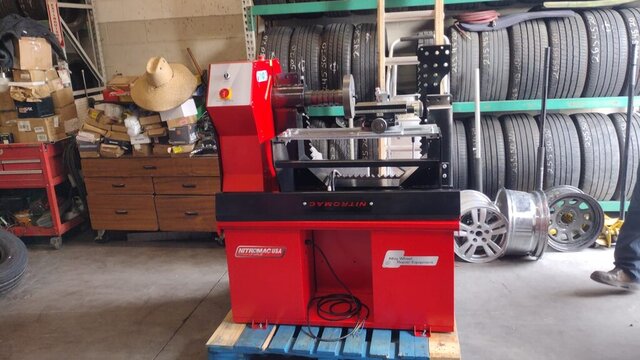 Tire mounting and balancing machine at VDK Tire Shop
