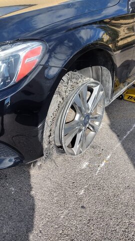 Shredded Tire On Black Car 009 — VDK Tire Shop