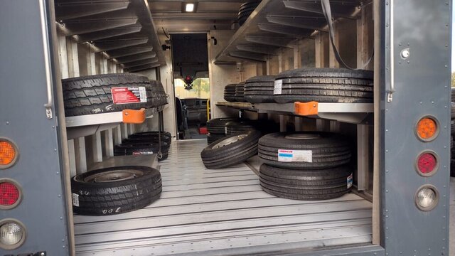 Stacked Tires Inside Cargo Trailer 012 — VDK Tire Shop