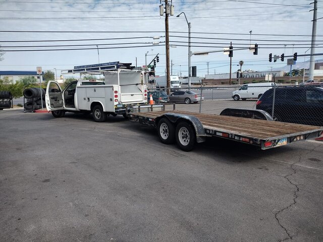 White Utility Truck Towing Flatbed Trailer 013 — VDK Tire Shop