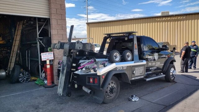 Tow Truck Parked Outside Garage 008 — VDK Tire Shop