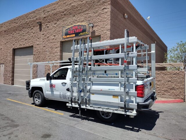 White Pickup Truck Glass Rack 076 — VDK Tire Shop