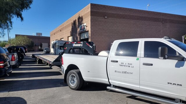 White Ram Truck Towing Flatbed 002 — VDK Tire Shop