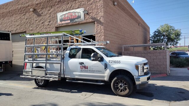 White Utility Truck Glass Rack 033 — VDK Tire Shop