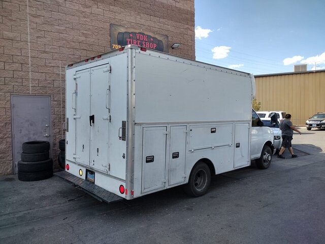 White Utility Truck Parked Outside 057 — VDK Tire Shop