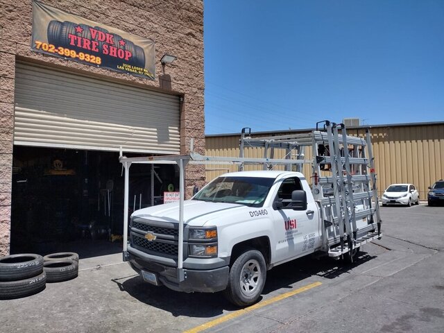 White Work Truck Outside Tire Shop 077 — VDK Tire Shop