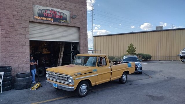 Yellow Vintage Truck Tire Shop 042 — VDK Tire Shop